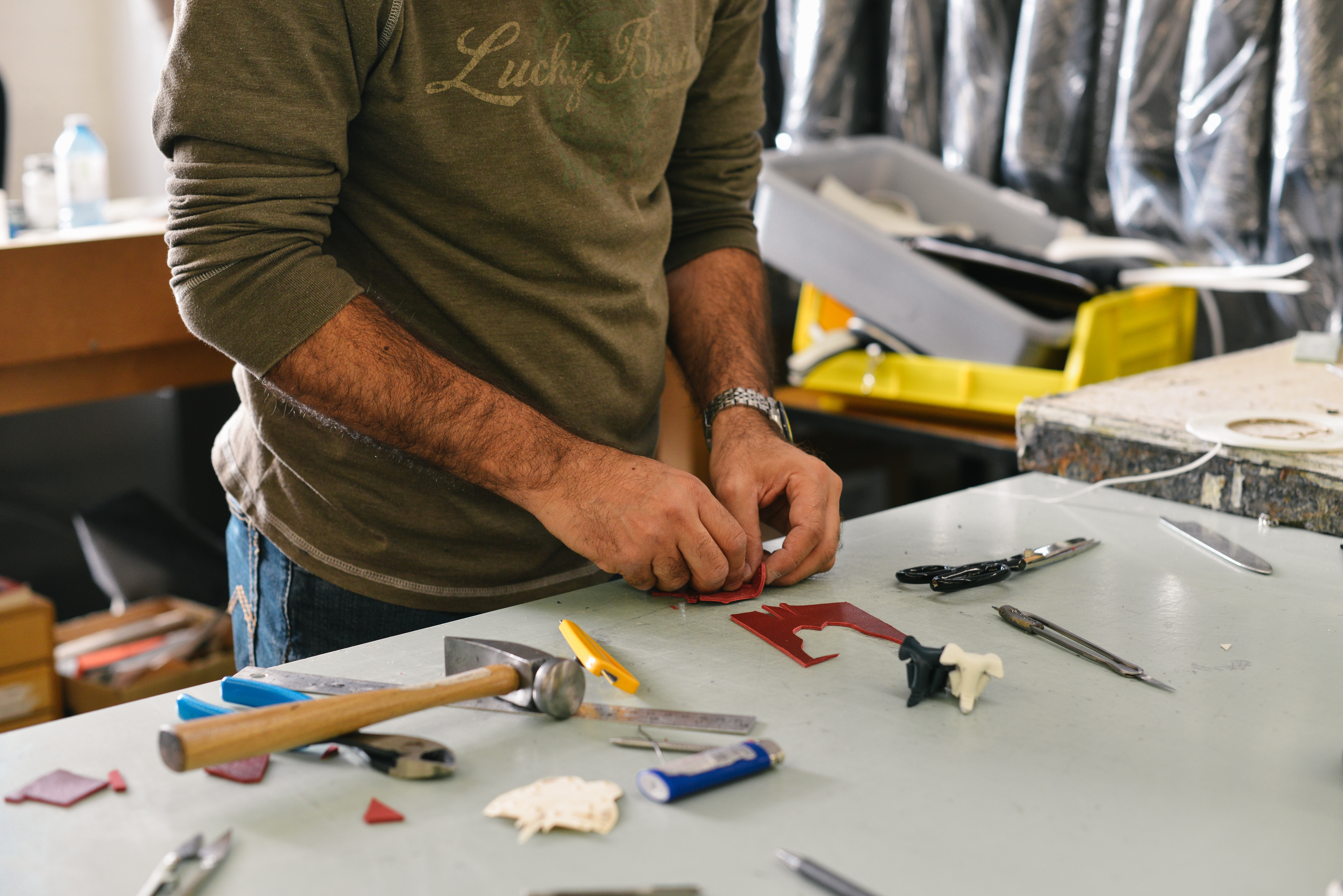 A contractor working at a bench